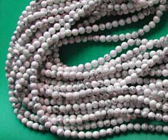 Hip hop fashion jewelry catalog direct wholesale online presenting genuine white picture stone bead. White picture stone is a powerful self purify tool.