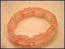 Fashion trend 2004 online wholesale  rose quartz beads forming fashion stretchy bracelet. Rose quartz can enhance emotional balance. Very good for expressing and soothing emotions. You can still benefit from this bracelet jewelry form its perfect pinky rose color.
