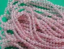 Wholesale import healing stone crystal suppliers presentung smooth rounded pinky genuine rose quartz beads.